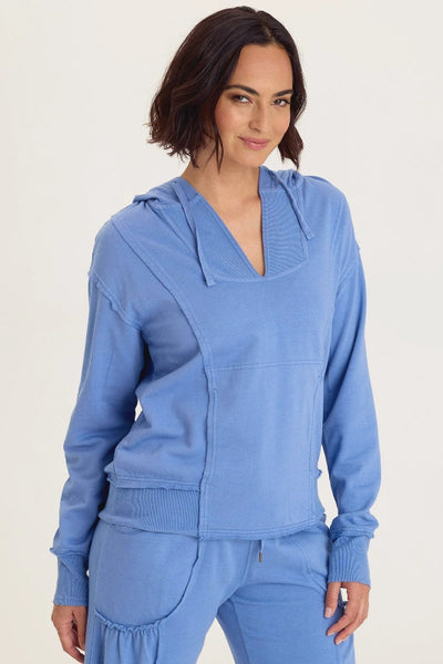 Front view of Rosalyn fleece hoodie in Shasta Lake sky blue with v-neck on mode