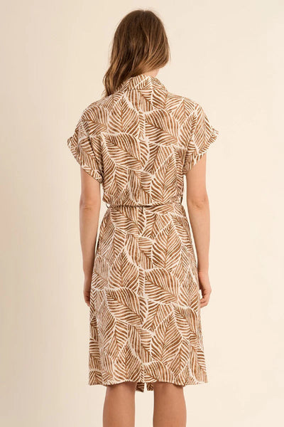 Palm print shirt dress with tie waist in natural tones.