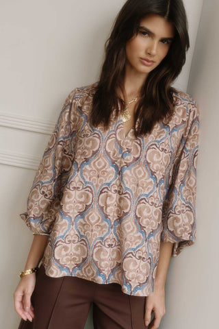 Paisley print blouse with V-neck and balloon sleeves.