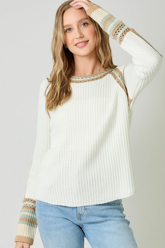 Raglan Sleeve Trim Detail Sweater Top in ivory waffle-knit with contrast crochet trim and striped cuffs.