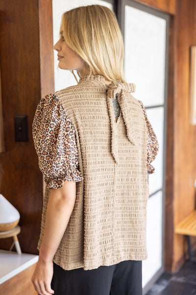 EFFORTLESSLY STYLISH HIGH NECK RUFFLE DETAIL TOP WITH ANIMAL PRINT PUFF SLEEVES