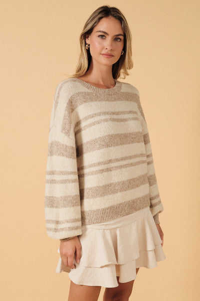Three-quarter view of Sunday Edition cream and taupe striped crewneck sweater;Sunday Edition neutral striped sweater
cream and taupe striped sweater
women’s slouchy crewneck sweater
relaxed fit striped knit sweater
drop-shoulder sweater for women
cozy neutral pullover sweater
cream striped sweater for fall
women’s soft knit striped sweater
casual striped sweater with ribbed hem
neutral sweater to wear with jeans