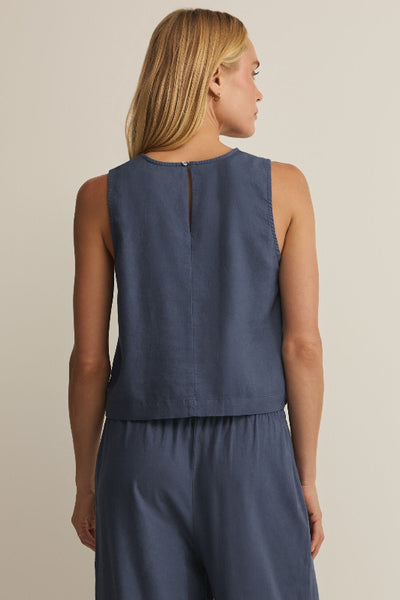 Back view of Sloane linen tank top in vintage indigo with keyhole button detail, fully lined, soft-washed finish
