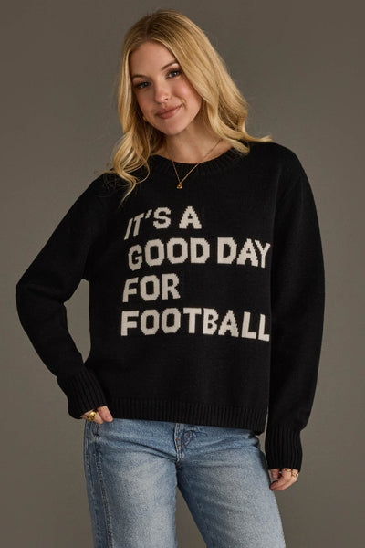 PANACHE, 100% acrylic;lack sweater with 'It's a Good Day for Football' text