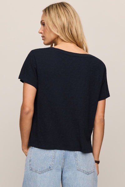 Nomad V Neck Tee in navy, a relaxed V-neck short sleeve tee in 100% cotton brushed slub jersey, styled with light wash wide-leg jeans — Back view.