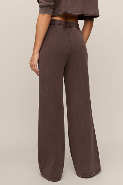 Model wearing Z Supply Hunter knit pants with an elastic drawcord waistband, side pockets, and full-length straight legs;Z Supply Hunter Knit Pants
women’s knit denim pants
women’s French terry pants
mineral wash pants for women
full-length pull-on pants
women’s drawstring waistband pants
women’s side pocket knit pants
casual wide-leg pants women
cotton blend lounge pants
relaxed everyday pants women; DARK CHOCOLATE