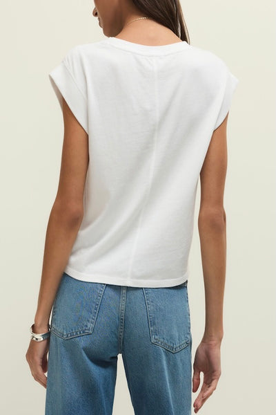 Back side of white Camino cotton jersey crew neck t-shirt with short sleeves and relaxed fit, styled with blue jeans.