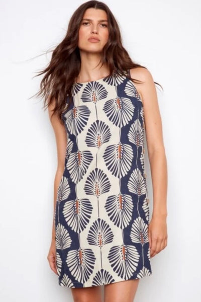 Navy and cream palm leaf printed sleeveless linen blend shift dress with crew neckline and decorative side button detail.