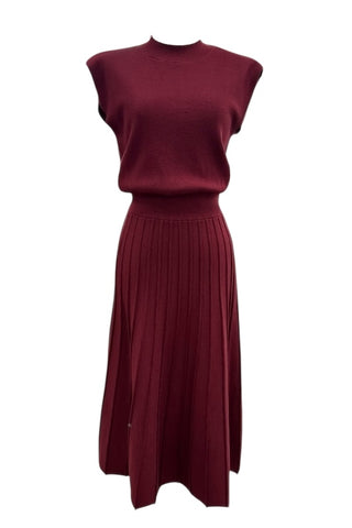 Sleeveless ribbed knit maxi dress by THML with mock neck and pleated skirt .