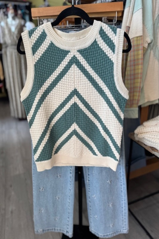 Sleeveless chevron knit tank top in seafoam green and ivory with textured stitching and ribbed crew neckline.