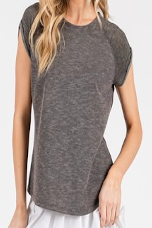 Short sleeve raglan tee with round neckline.