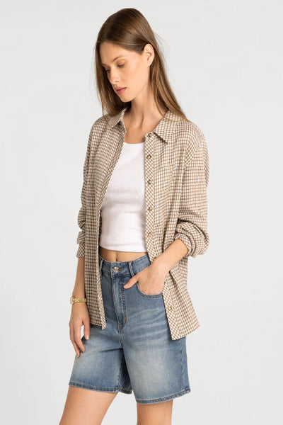 Front view of Thread & Supply Navigator Top in Ivory Tan Plaid showing button front and rolled sleeves.Thread & Supply Navigator Top, Thread and Supply plaid shirt, Ivory Tan Plaid shirt, women’s cotton plaid button-up, relaxed fit plaid shirt women, longline cotton shirt, neutral plaid button-up shirt, women’s long sleeve cotton shirt, collared plaid layering shirt, shirttail hem button-up.