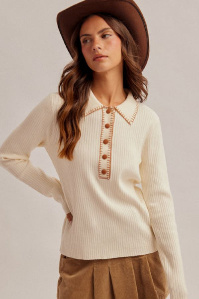 embroidered collar polo sweater
ribbed knit polo sweater women
cream polo sweater long sleeve
western style knit sweater
whipstitch collar sweater
half button placket sweater top
Hem and Thread sweater
cotton nylon ribbed sweater
boho western sweater top
fitted ribbed knit top women
