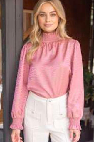 POLISHED AND PLAYFUL SMOCKED MOCK NECK LONG SLEEVE ANIMAL PRINT TOP