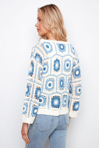 Back view of drop shoulder crochet sweater showing granny square pattern