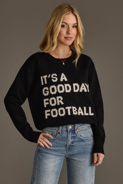 PANACHE, 100% acrylic;lack sweater with 'It's a Good Day for Football' text