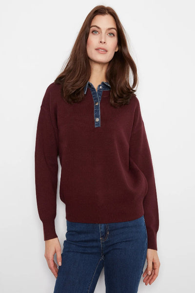 Front view of Charlie B merlot polo sweater with denim blue collar, snap placket, and ribbed hem.Charlie B denim trim polo sweater; Charlie B merlot sweater; women’s merlot polo sweater; denim collar sweater women; burgundy sweater with denim collar; women’s snap placket sweater; relaxed fit polo sweater women; long sleeve collared knit sweater; women’s drop shoulder sweater; Charlie B fall knitwear.