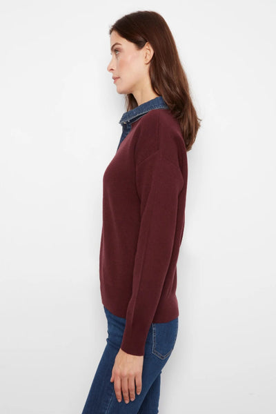 Side view of Charlie B merlot polo sweater showing denim collar, drop shoulder, and long sleeve. Charlie B denim trim polo sweater; Charlie B merlot sweater; women’s merlot polo sweater; denim collar sweater women; burgundy sweater with denim collar; women’s snap placket sweater; relaxed fit polo sweater women; long sleeve collared knit sweater; women’s drop shoulder sweater; Charlie B fall knitwear.