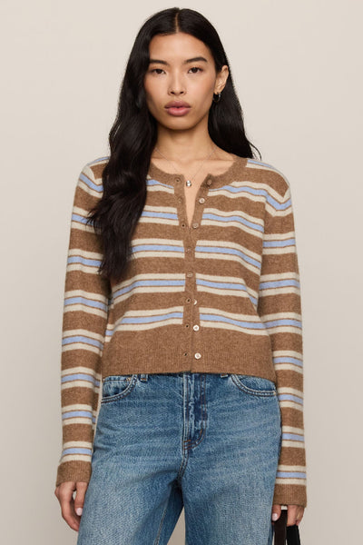 Front view of the Z Supply Medina Stripe Cardigan in Golden Caramel with cream and pale blue stripes, crew neck, and button front. Z Supply Medina Stripe Cardigan; Z Supply Golden Caramel cardigan; ZW263330 cardigan; women’s caramel striped cardigan; cream and blue stripe cardigan; crew neck button front cardigan; Z Supply Cozy Spring Yarns cardigan; women’s short knit cardigan; striped cardigan for high-rise jeans.