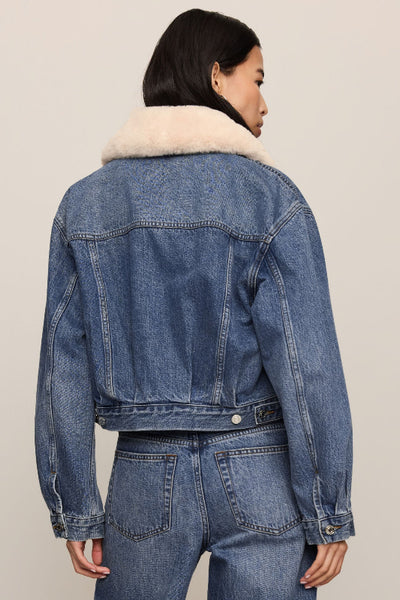 Back view of Z Supply The Daily Denim Fur Jacket showing blue denim, a cream collar, and long sleeves. Z Supply Daily Denim Fur Jacket
Z Supply ZJ264926 jacket
Z Supply Hush denim jacket
women’s denim jacket with removable collar
blue denim jacket with plush collar
women’s cream fur collar denim jacket
women’s cropped denim jacket
vintage wash denim jacket women
women’s cotton button front denim jacket
denim jacket for high rise jeans