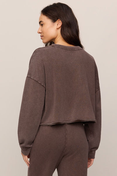 Back view of Z Supply Circuit Sweatshirt in Dark Chocolate showing long sleeves and a relaxed silhouette.Z Supply Circuit sweatshirt; Z Supply Dark Chocolate sweatshirt; Z Supply ZT263247; women's chocolate brown sweatshirt; women's cotton French terry sweatshirt; women's cropped crewneck sweatshirt; relaxed fit brown sweatshirt; long sleeve cotton pullover; dropped shoulder sweatshirt; Z Supply women's sweatshirt.

