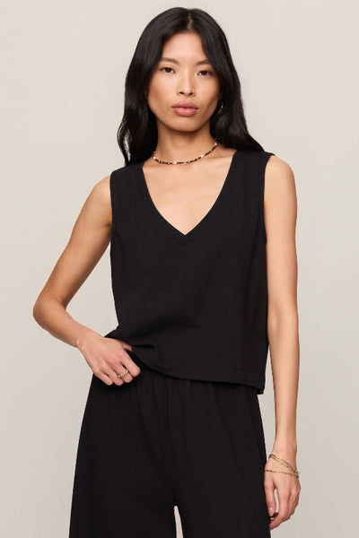  Z Supply Sloane V Neck Top in black - front view, deep V-neckline, sleeveless, relaxed fit, 100% cotton mineral wash jersey.

