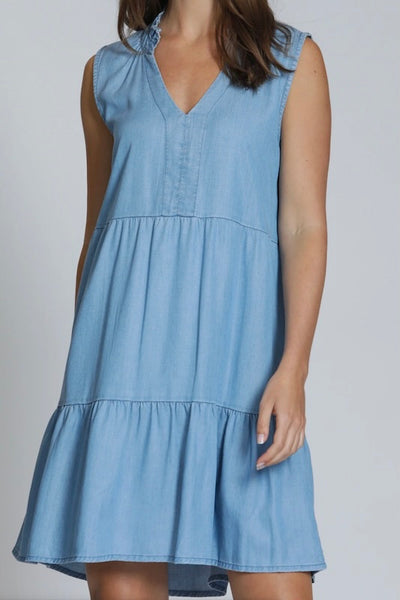 Front view of the Tencel Sleeveless Dress With Split Neck in light blue, featuring a split V-neckline, sleeveless design, and tiered skirt with ruffled hem.