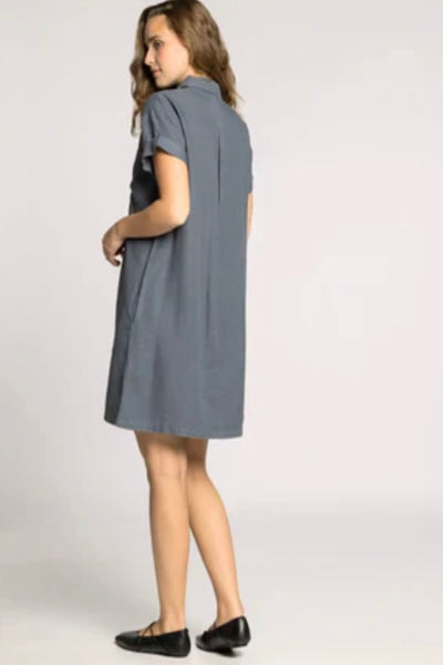 Back and side view of June Dress showing relaxed silhouette, cuffed sleeves, and knee-length hem in charcoal Lyocell fabric