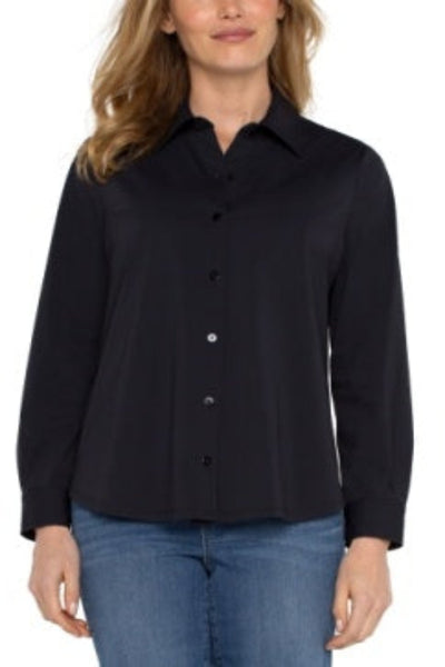 Liverpool Long Sleeve Button-Front Knit Shirt in classic black, collared neckline, button-front closure, long sleeves, relaxed fit styled with denim — front view on model.