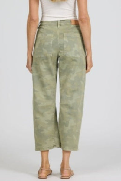 Model is wearing high-rise Dear John Lasso Jeans in Riviera camo print showing back pockets and clean cropped hem, back view.