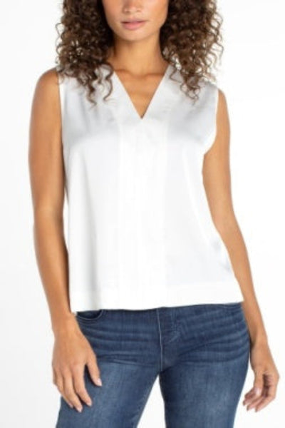 POLISHED SLEEVELESS V-NECK WOVEN-TO-KNIT TOP