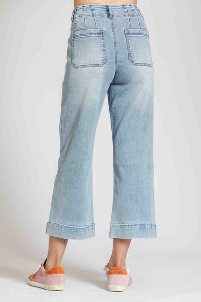 Light wash cropped wide leg denim with patch pockets.