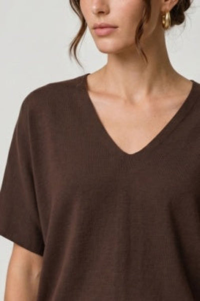 Close-up of Liverpool Short Sleeve V-Neck Dolman Popover Sweater in java brown showing fine knit texture and V-neckline detail.