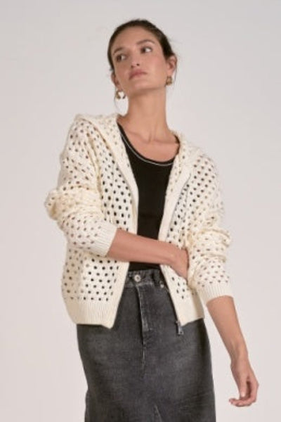 Off White open-knit crochet full-zip hoodie with relaxed fit, styled over a black tank and dark denim skirt — front view.