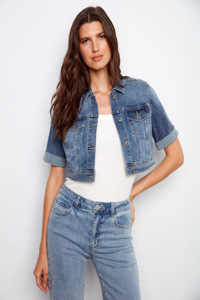 Cropped light blue denim jacket with short rolled sleeves on model